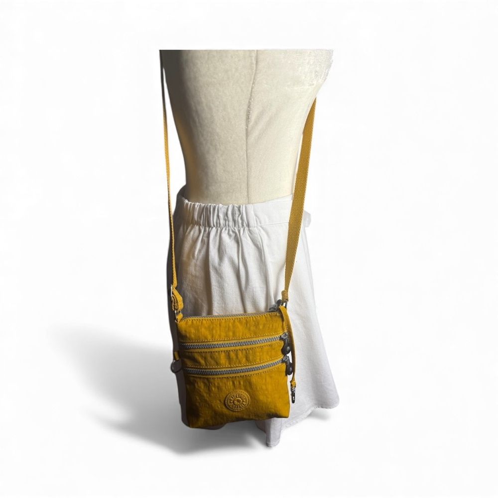 Kipling Mustard Mini Crossbody Bag 2pockets 24”drop 6”x7” Unique design Zipped